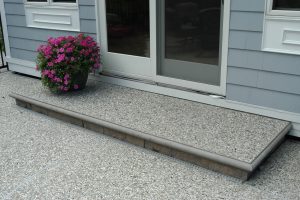 Poured exposed aggregate step