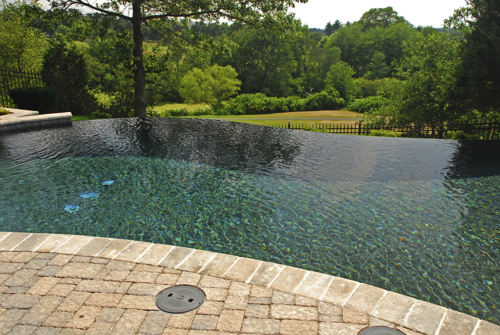 Infinity pool hardscape design