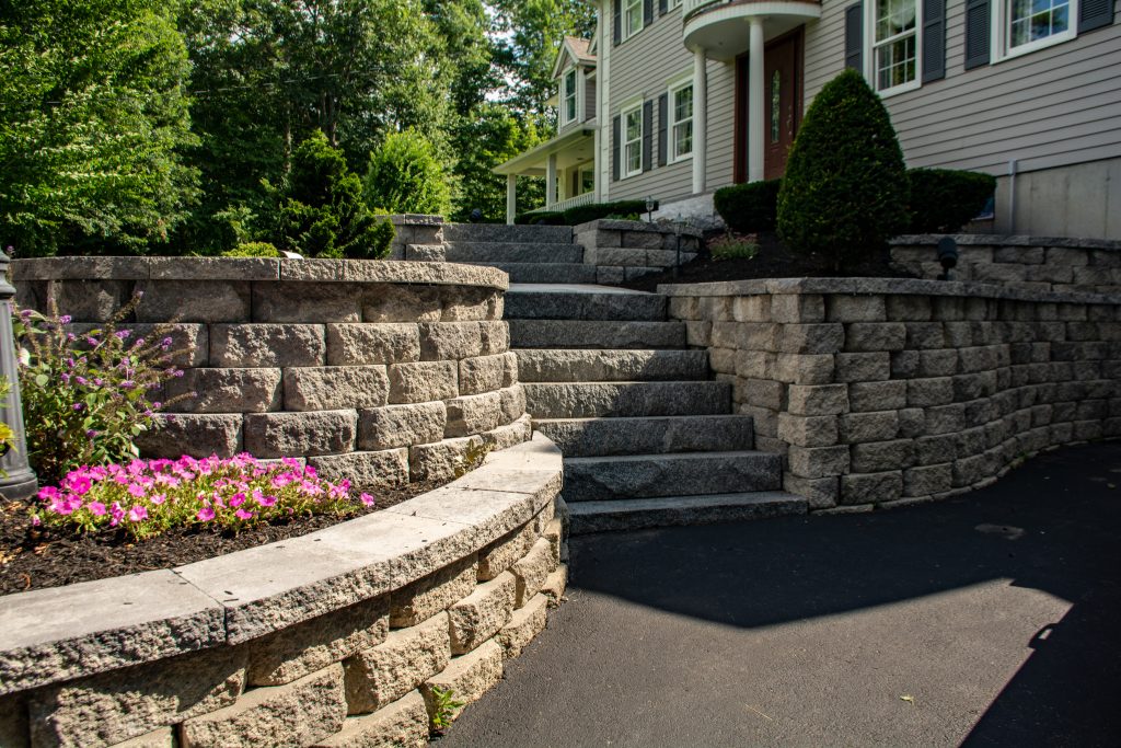 Curved retaining wall with flowers