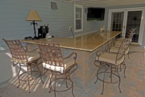 Seating area around outdoor kitchen