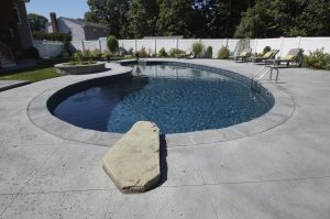 Saw cut concrete pool patio