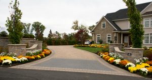 Custom paver driveway with apron and pillars. 