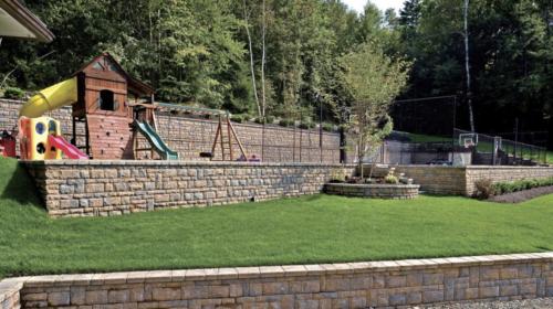 Techo Bloc retaining wall with back yard play area