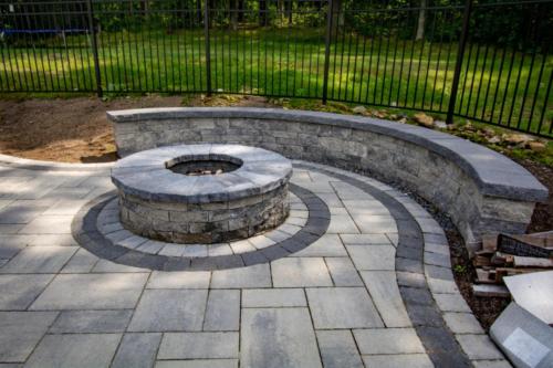 Natural Stone retaining wall around patio and fire pit