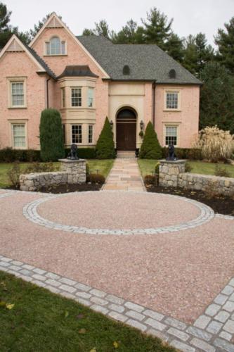 Aggregate Driveway with Stone Wall