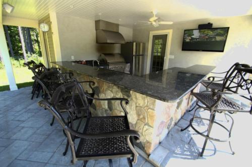 Outdoor Living Covered Bar with TV
