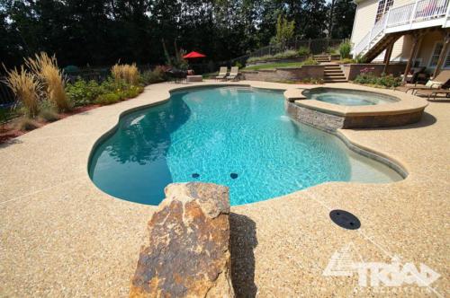 Exposed Aggregate Pool Deck with Natural Stone Diving Platform
