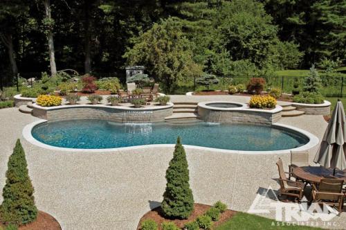 Exposed Aggregate Pool Patio with Waterfalls