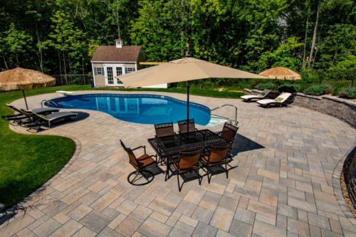 Paver pool patio with cabana